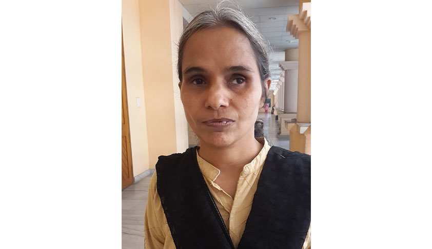 Visually challenged woman before the High Court of Kerala challenging the alleged denial of benefit of age relaxation to her by Kannur University