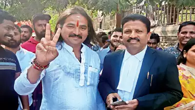 HRS leader Dhananjay Desai and his lawyer Milind Pawar outside Pune Sessions Court (Picture Courtesy : Times of India) 